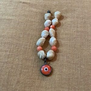 Coral evil eye bracelet
